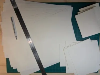 feuilles de papier débitées en cahiers